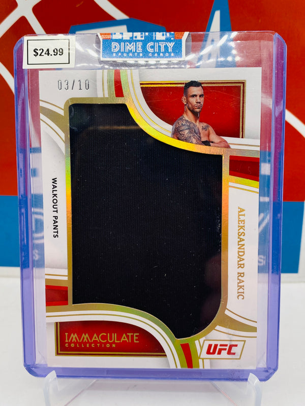 Panini Immaculate UFC 2023 Fighter Used Walkout Shorts Patch Gold #/10